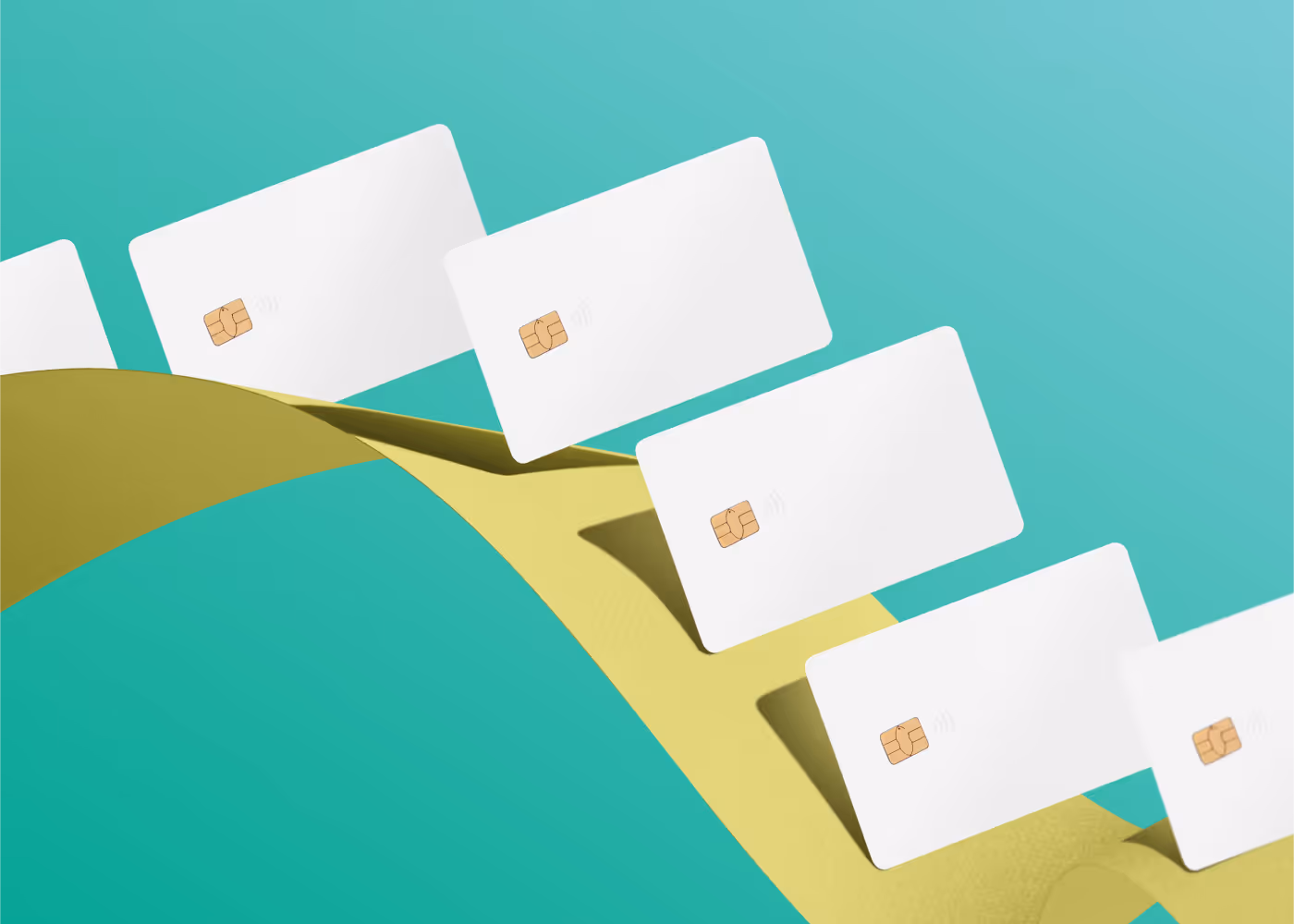 Multiple white credit cards on a green background